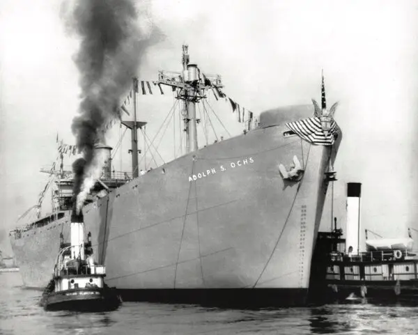 Liberty Ship SS Adolph S. Ochs launching, WWII-era cargo vessel powered by older steam engines over more efficient diesels
